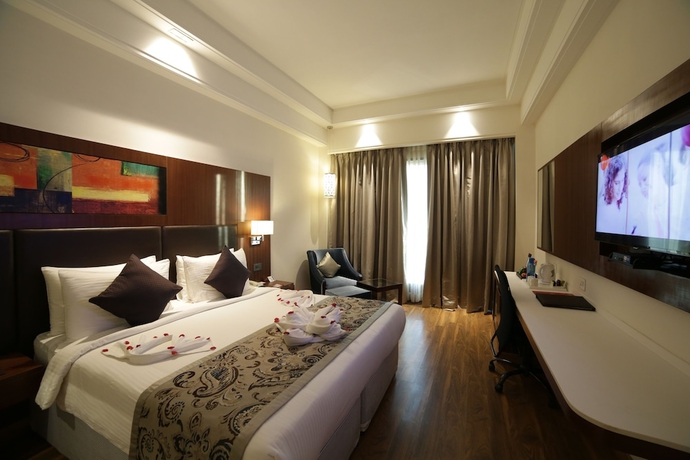 Imagen de la habitación del Hotel The P L Palace Agra. Foto 8