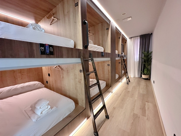Imagen de la habitación del Hotel The POD Suite Hostel Blasco. Foto 12