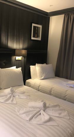 Imagen de la habitación del Hotel The Pack And Carriage London. Foto 2