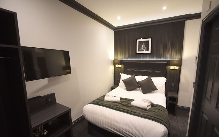 Imagen de la habitación del Hotel The Pack And Carriage London. Foto 8