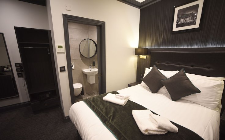 Imagen de la habitación del Hotel The Pack And Carriage London. Foto 9