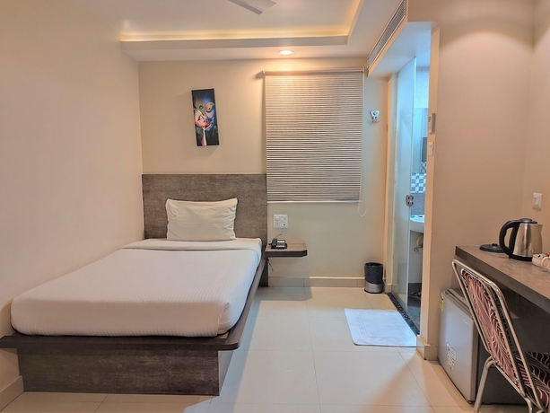 Imagen de la habitación del Hotel The Padma. Foto 11