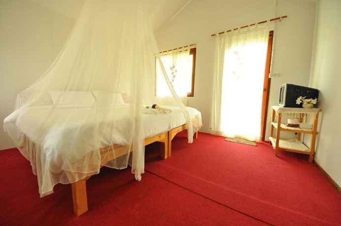 Imagen de la habitación del Hotel The Pai Resort. Foto 19