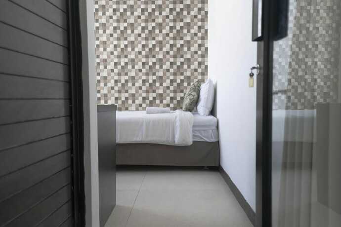 Imagen de la habitación del Hotel The Paica. Foto 15