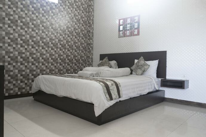 Imagen de la habitación del Hotel The Paica. Foto 16