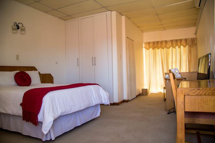 Imagen de la habitación del Hotel The Palace, Thabana Tsuana. Foto 6