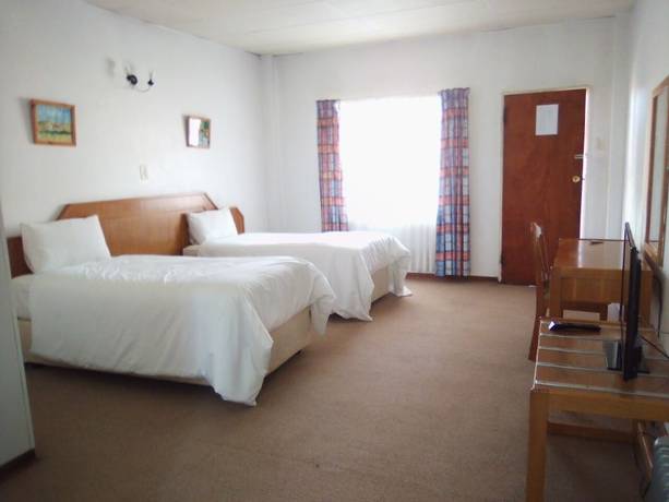 Imagen de la habitación del Hotel The Palace, Thabana Tsuana. Foto 15