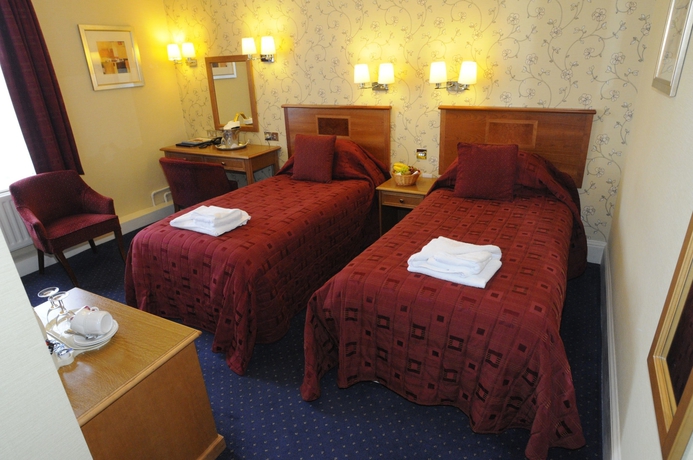 Imagen de la habitación del Hotel The Palace and Spa. Foto 9