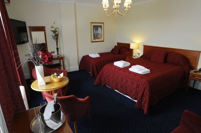 Imagen de la habitación del Hotel The Palace and Spa. Foto 10