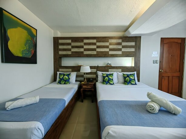 Imagen de la habitación del Hotel The Palacio De Laoag. Foto 11