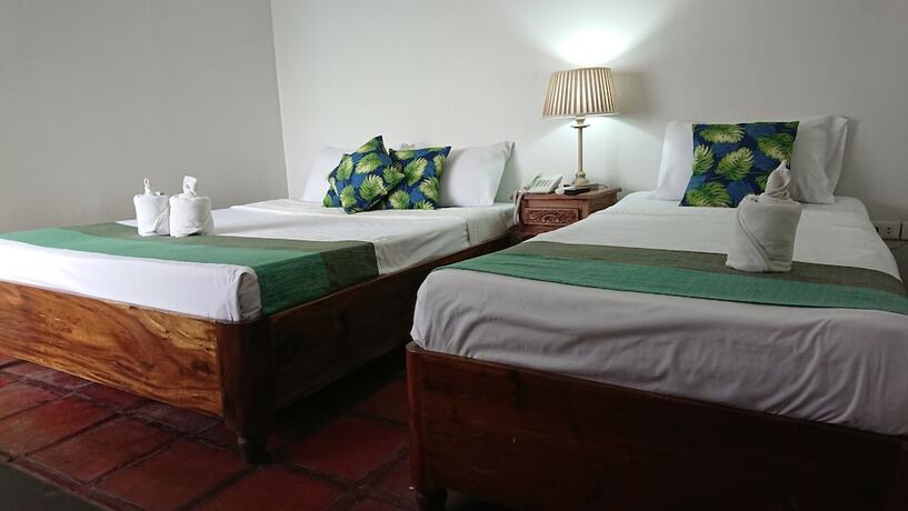 Imagen de la habitación del Hotel The Palacio De Laoag. Foto 12