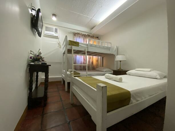 Imagen de la habitación del Hotel The Palacio De Laoag. Foto 14