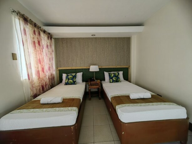 Imagen de la habitación del Hotel The Palacio De Laoag. Foto 18