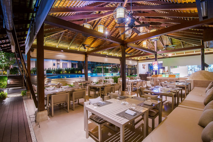 Imagen del bar/restaurante del Hotel The Palayana Hua Hin. Foto 11