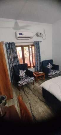Imagen de la habitación del Hotel The Palm Bliss Resort. Foto 18