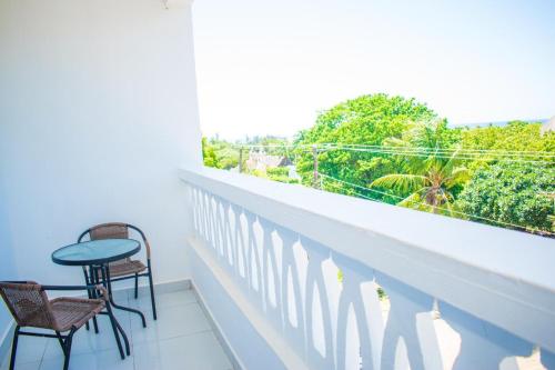 Imagen de la habitación del Hotel The Palm Diani Resort. Foto 20
