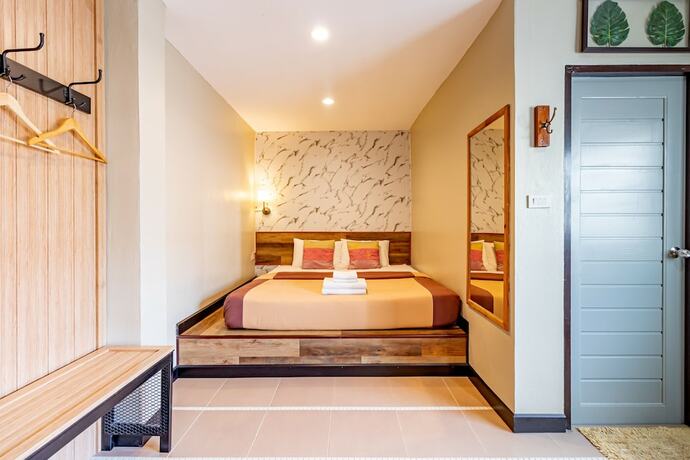 Imagen de la habitación del Hotel The Palm. Foto 14