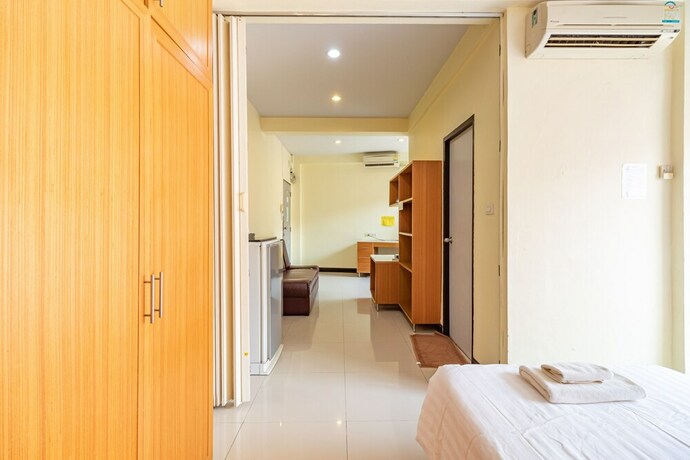 Imagen de la habitación del Hotel The Palm. Foto 20