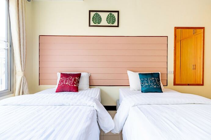 Imagen de la habitación del Hotel The Palm. Foto 25