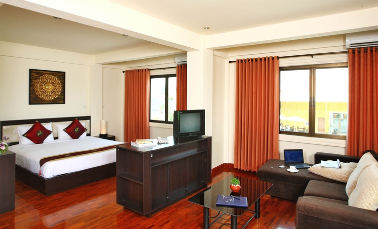 Imagen de la habitación del Hotel The Palm Garden. Foto 6