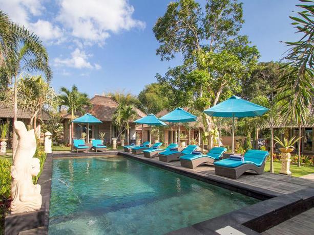 Imagen de la piscina del Hotel The Palm Grove Villas Lembongan. Foto 4