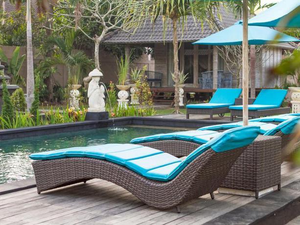 Imagen de la piscina del Hotel The Palm Grove Villas Lembongan. Foto 5
