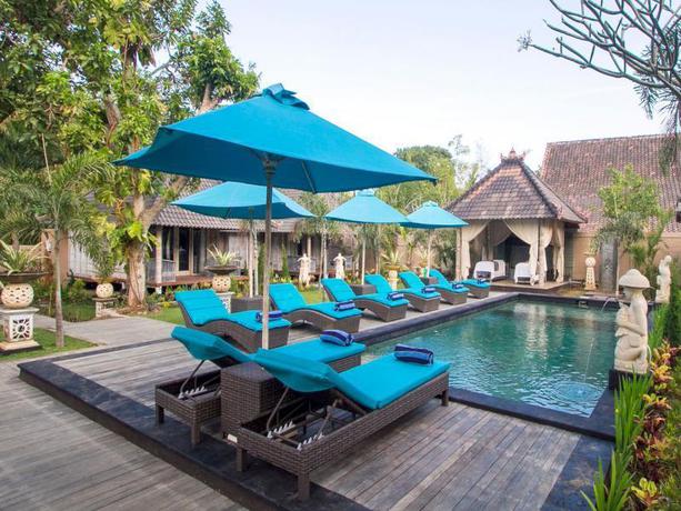 Imagen de la piscina del Hotel The Palm Grove Villas Lembongan. Foto 6