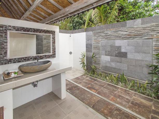 Imagen de la habitación del Hotel The Palm Grove Villas Lembongan. Foto 3