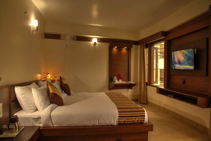 Imagen de la habitación del Hotel The Palm, Mahargaon. Foto 3
