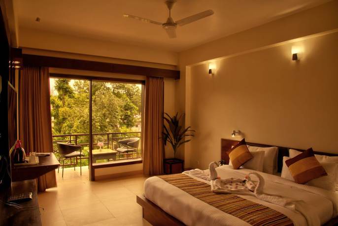 Imagen de la habitación del Hotel The Palm, Mahargaon. Foto 4