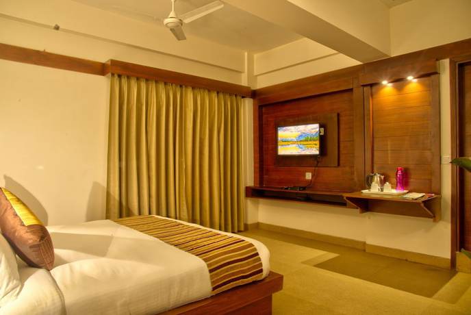 Imagen de la habitación del Hotel The Palm, Mahargaon. Foto 5