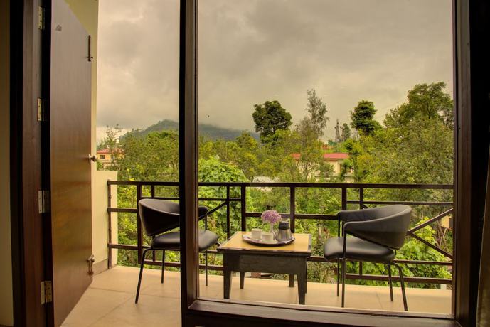 Imagen de la habitación del Hotel The Palm, Mahargaon. Foto 6