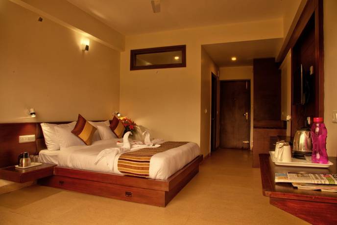 Imagen de la habitación del Hotel The Palm, Mahargaon. Foto 7
