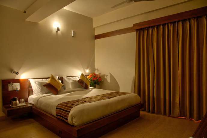 Imagen de la habitación del Hotel The Palm, Mahargaon. Foto 9