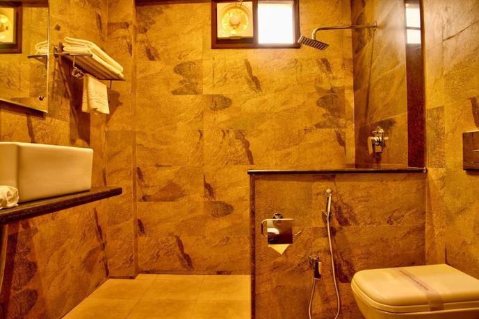 Imagen de la habitación del Hotel The Palm, Mahargaon. Foto 11