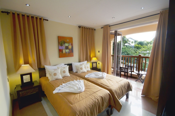 Imagen de la habitación del Hotel The Palm Seychelles. Foto 8
