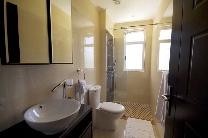 Imagen de la habitación del Hotel The Palm Seychelles. Foto 12