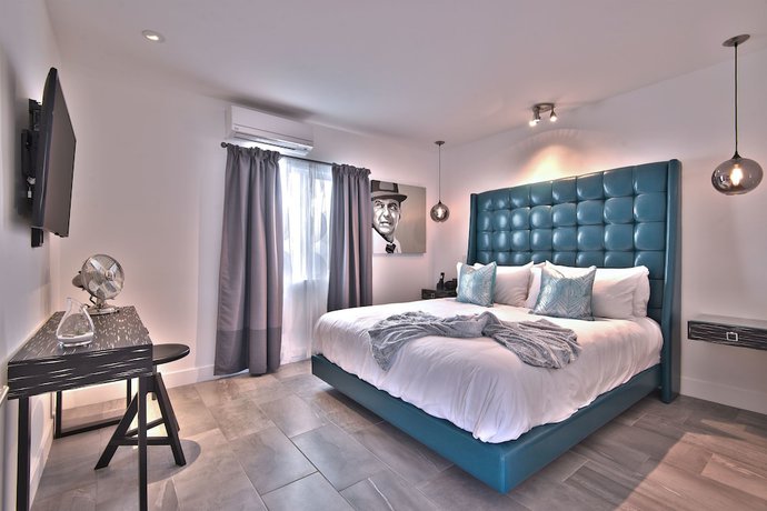Imagen de la habitación del Hotel The Palm Springs. Foto 14