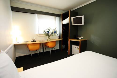 Imagen de la habitación del Hotel The Palmer Collective. Foto 5