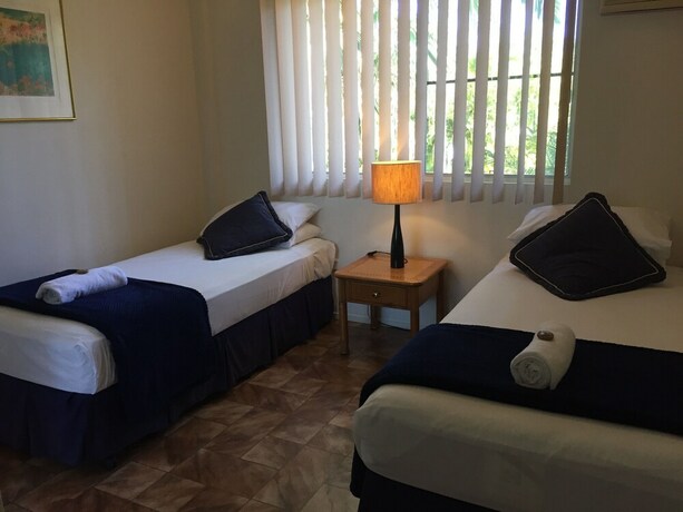 Imagen de la habitación del Hotel The Palms At Palm Cove. Foto 30
