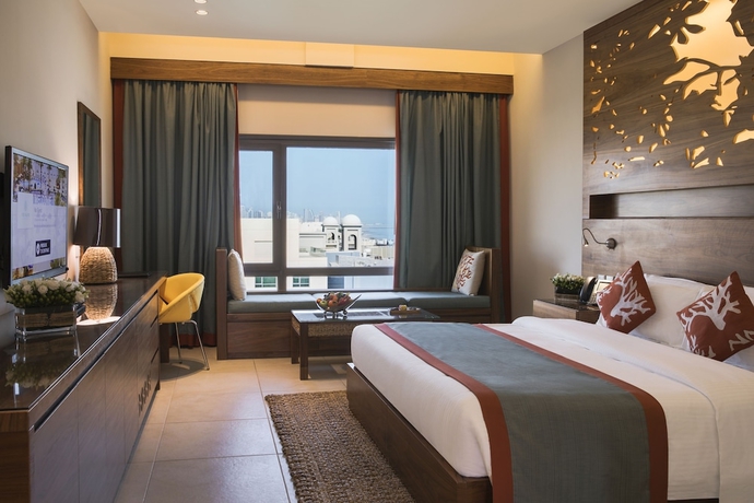 Imagen de la habitación del Hotel The Palms Beach and Spa. Foto 2