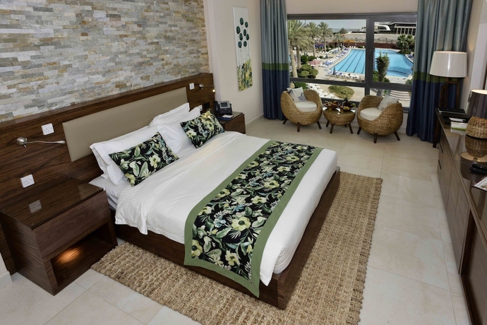 Imagen de la habitación del Hotel The Palms Beach and Spa. Foto 5