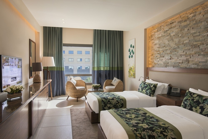 Imagen de la habitación del Hotel The Palms Beach and Spa. Foto 9