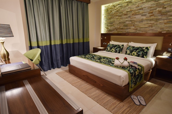 Imagen de la habitación del Hotel The Palms Beach and Spa. Foto 13