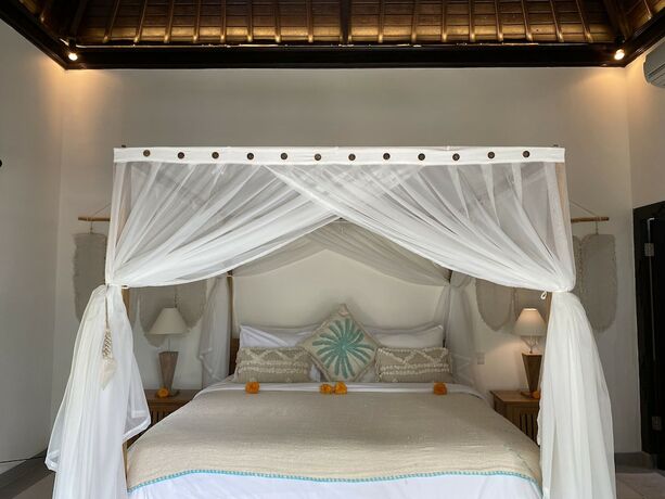 Imagen de la habitación del Hotel The Palms Canggu. Foto 11