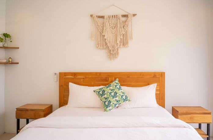 Imagen de la habitación del Hotel The Palms Canggu. Foto 15
