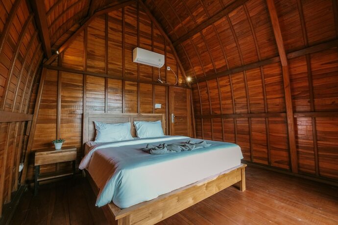 Imagen de la habitación del Hotel The Palms Canggu. Foto 16