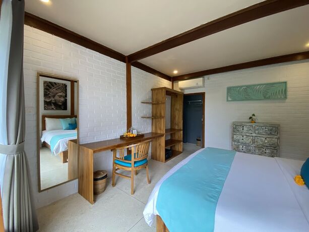 Imagen de la habitación del Hotel The Palms Canggu. Foto 18