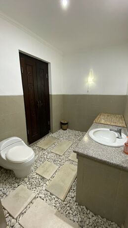 Imagen de la habitación del Hotel The Palms Canggu. Foto 20