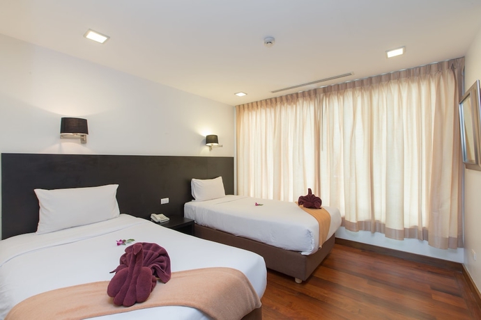Imagen de la habitación del Hotel The Palms Kamala Beach. Foto 9